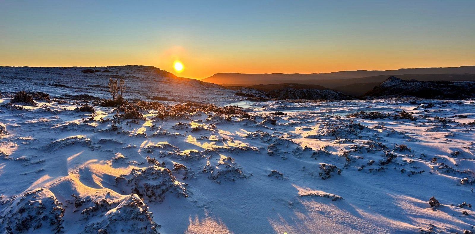 Snow at sunrise